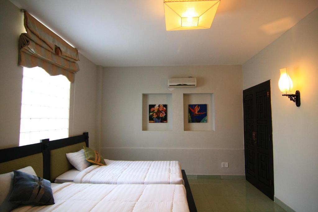 Faifoo Boutique Hotel Hô Chi Minh-Ville Chambre photo